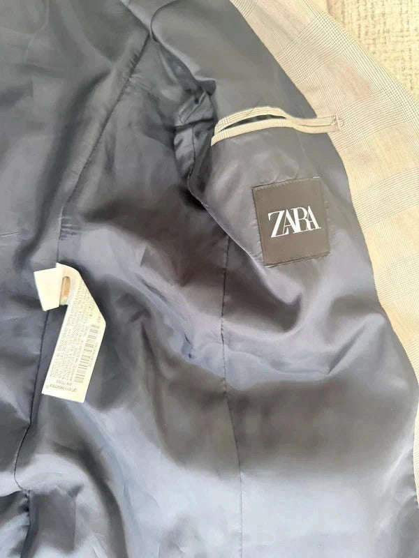 Blazer gris à carreaux élégant – coupe classique – très bon état